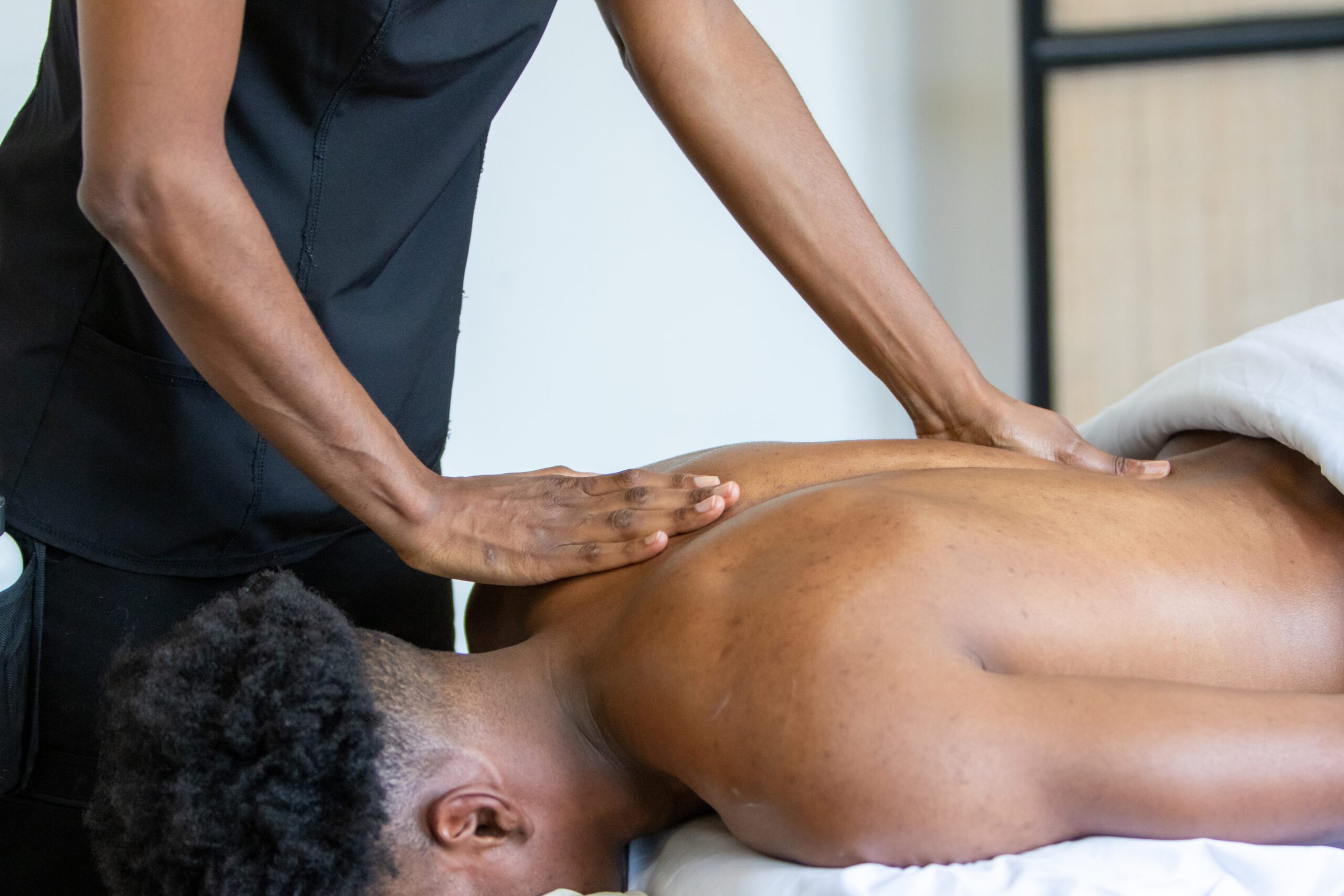 Man Lies On The Massage Table